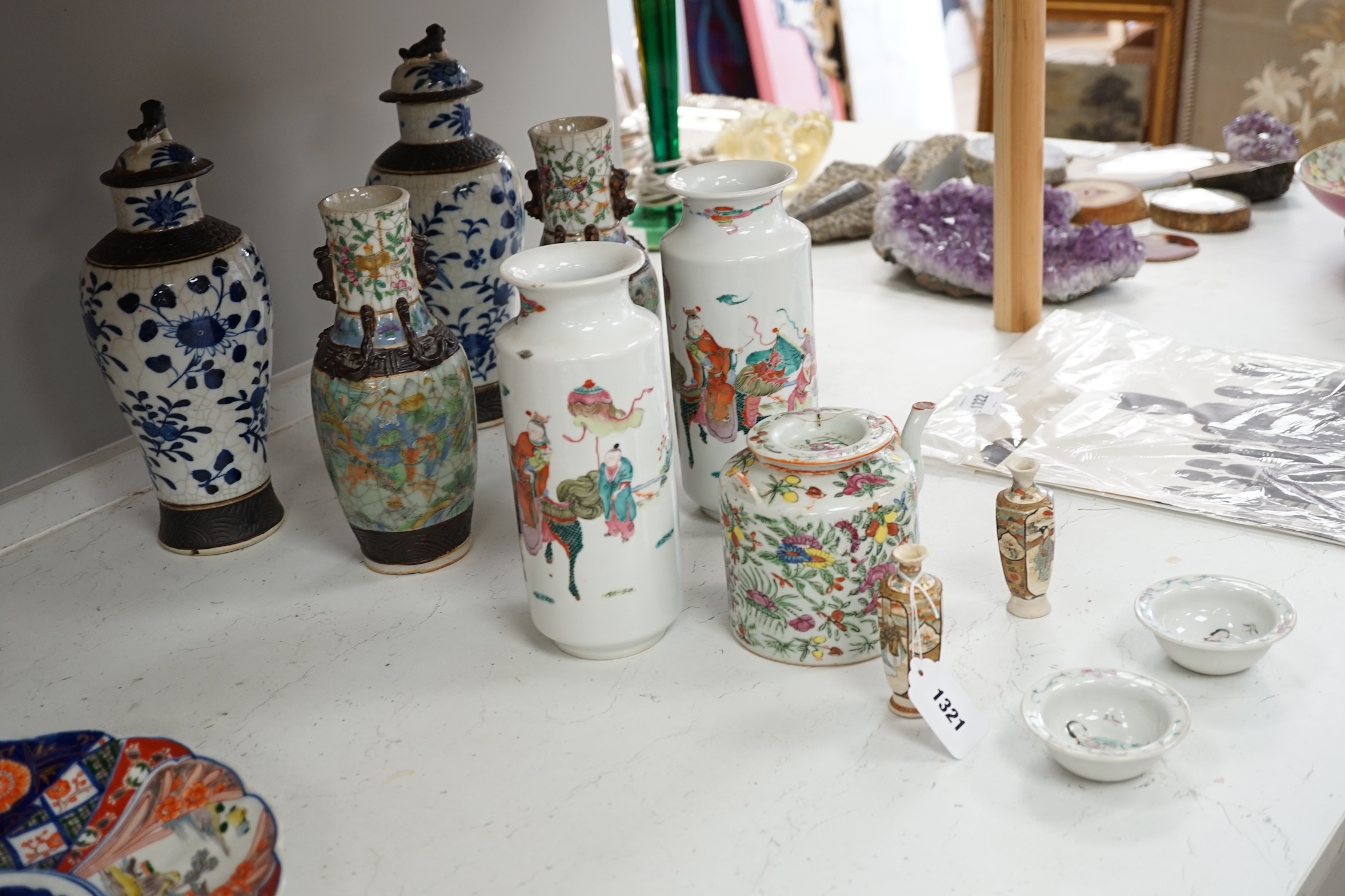Three pairs of Chinese vases, a teapot, two bowls and a pair of miniature Satsuma vases, tallest item crackleware vases and covers 32cm high. Condition - poor